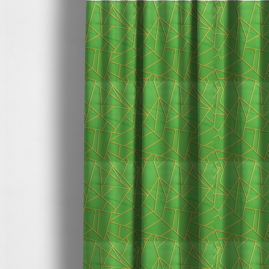 The fabric used to create these made-to-measure curtains is a vibrant bright green fabric featuring a fractured, geometric mosaic pattern. The lively, matte background is segmented by a network of recessed metallic gold lines that form sharp, irregular polygons. This "cracked ice" or shattered-glass effect creates a bold, modern look, combining a lush, verdant base with shimmering, Art Deco-inspired accents.