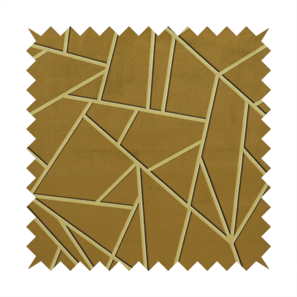 A close-up of a luxurious olive gold or antique brass-coloured fabric featuring a fractured, geometric mosaic pattern. The rich, matte background is segmented by a network of recessed tone-on-tone lines in a slightly lighter, shimmering shade. This "cracked ice" or shattered-glass effect creates a subtle, sophisticated 3D texture, blending mid-century modern influence with contemporary Art Deco elegance.