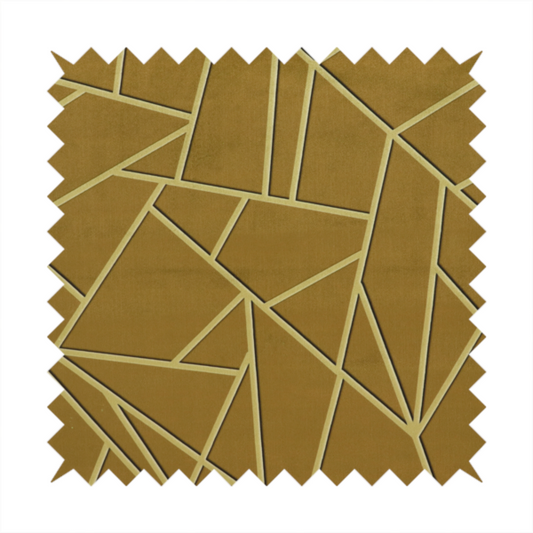 A close-up of a luxurious olive gold or antique brass-coloured fabric featuring a fractured, geometric mosaic pattern. The rich, matte background is segmented by a network of recessed tone-on-tone lines in a slightly lighter, shimmering shade. This "cracked ice" or shattered-glass effect creates a subtle, sophisticated 3D texture, blending mid-century modern influence with contemporary Art Deco elegance.