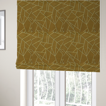 The fabric used to create these Roman blinds is a luxurious olive gold or antique brass-coloured fabric featuring a fractured, geometric mosaic pattern. The rich, matte background is segmented by a network of recessed tone-on-tone lines in a slightly lighter, shimmering shade. This "cracked ice" or shattered-glass effect creates a subtle, sophisticated 3D texture, blending mid-century modern influence with contemporary Art Deco elegance.