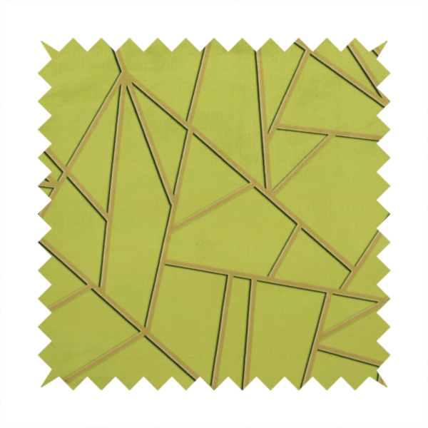 A close-up of a luxurious lime or chartreuse green fabric featuring a fractured, geometric mosaic pattern. The vibrant, matte background is segmented by a network of recessed metallic gold lines that form sharp, irregular polygons. This "shattered-glass" effect combines a high-energy, citrus-toned base with shimmering, Art Deco-inspired gold linework for a bold and architectural look.