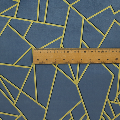 A close-up of a luxurious slate grey fabric featuring a fractured, geometric mosaic pattern. The deep, matte background is segmented by a network of recessed metallic gold lines that form sharp, irregular polygons. This "shattered-glass" effect creates a striking visual contrast, blending the cool, dark tones of the textile with shimmering, Art Deco-inspired accents for a modern, high-end look.