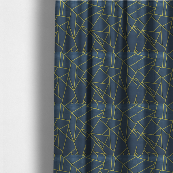 The fabric used to create these made-to-measure curtains is a luxurious slate grey fabric featuring a fractured, geometric mosaic pattern. The deep, matte background is segmented by a network of recessed metallic gold lines that form sharp, irregular polygons. This "shattered-glass" effect creates a striking visual contrast, blending the cool, dark tones of the textile with shimmering, Art Deco-inspired accents for a modern, high-end look.