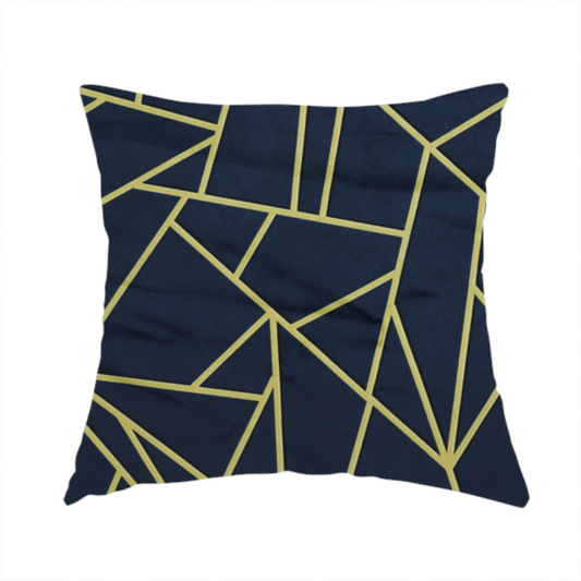 The fabric used to create this handmade cushion is a luxurious navy blue fabric featuring a fractured, geometric mosaic pattern. The dark, matte background is segmented by a network of recessed metallic gold lines that form sharp, irregular polygons. This "shattered-glass" or "cracked ice" effect creates a striking visual contrast, blending a deep, oceanic base with shimmering, Art Deco-inspired gold linework for a sophisticated, architectural look.