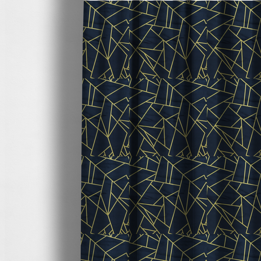 The fabric used to create these made-to-measure curtains is a  luxurious navy blue fabric featuring a fractured, geometric mosaic pattern. The dark, matte background is segmented by a network of recessed metallic gold lines that form sharp, irregular polygons. This "shattered-glass" or "cracked ice" effect creates a striking visual contrast, blending a deep, oceanic base with shimmering, Art Deco-inspired gold linework for a sophisticated, architectural look.