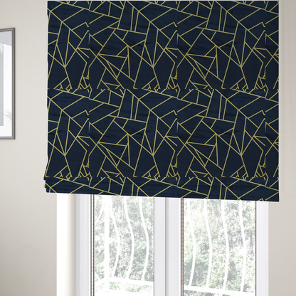 The fabric used to create these Roman blinds is a luxurious navy blue fabric featuring a fractured, geometric mosaic pattern. The dark, matte background is segmented by a network of recessed metallic gold lines that form sharp, irregular polygons. This "shattered-glass" or "cracked ice" effect creates a striking visual contrast, blending a deep, oceanic base with shimmering, Art Deco-inspired gold linework for a sophisticated, architectural look.