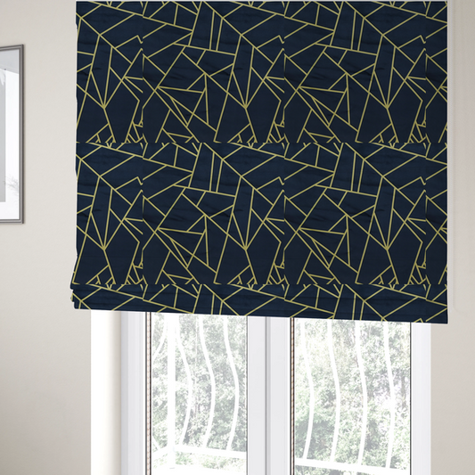 The fabric used to create these Roman blinds is a luxurious navy blue fabric featuring a fractured, geometric mosaic pattern. The dark, matte background is segmented by a network of recessed metallic gold lines that form sharp, irregular polygons. This "shattered-glass" or "cracked ice" effect creates a striking visual contrast, blending a deep, oceanic base with shimmering, Art Deco-inspired gold linework for a sophisticated, architectural look.