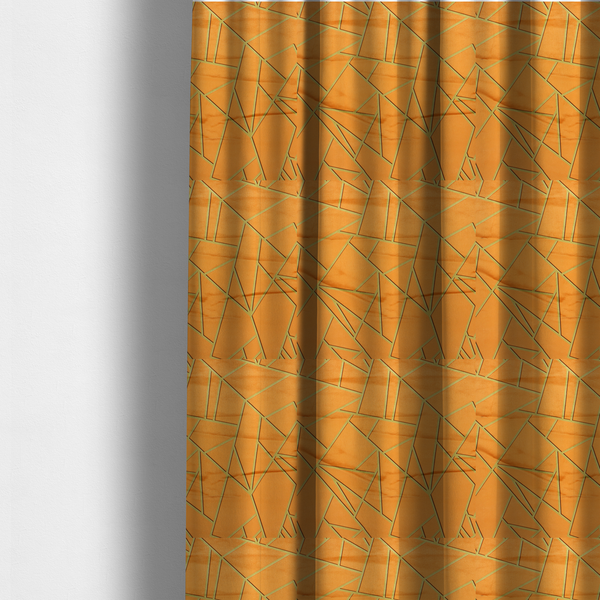 The fabric used to create these made-to-measure curtains is a luxurious bright orange or apricot fabric featuring a fractured, geometric mosaic pattern. The warm, vibrant background is segmented by a network of recessed metallic gold lines that form sharp, irregular polygons. This "shattered-glass" effect pairs a bold, citrus-toned base with shimmering, Art Deco-inspired gold linework, creating a high-contrast and architectural look with a subtle 3D texture.