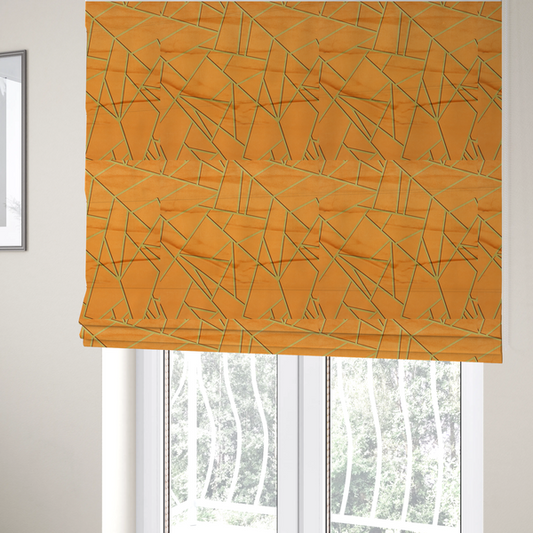 The fabric used to create these Roman blinds is a luxurious bright orange or apricot fabric featuring a fractured, geometric mosaic pattern. The warm, vibrant background is segmented by a network of recessed metallic gold lines that form sharp, irregular polygons. This "shattered-glass" effect pairs a bold, citrus-toned base with shimmering, Art Deco-inspired gold linework, creating a high-contrast and architectural look with a subtle 3D texture.