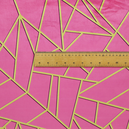 A close-up of a luxurious magenta or hot pink fabric featuring a fractured, geometric mosaic pattern. The vibrant, matte background is segmented by a network of recessed metallic gold lines that form sharp, irregular polygons. This "shattered-glass" effect creates a striking visual contrast, blending the intense, energetic pink base with shimmering, Art Deco-inspired gold linework for a modern and glamorous look.