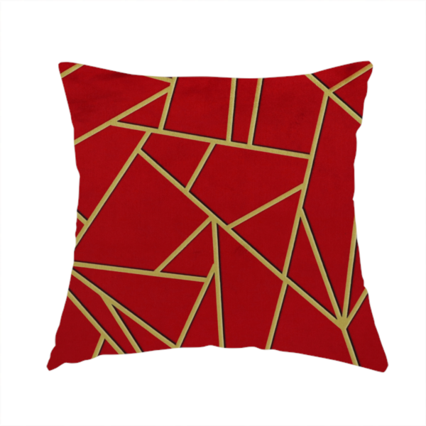 The fabric used to create this handmade cushion is a luxurious vibrant red fabric featuring a fractured, geometric mosaic pattern. The rich, matte background is segmented by a network of recessed metallic gold lines that form sharp, irregular polygons. This "shattered-glass" or "cracked ice" effect creates a striking visual contrast, blending the intense red base with shimmering, Art Deco-inspired gold linework for a dramatic and architectural look.