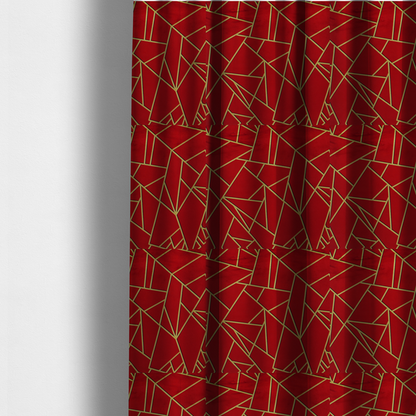 The fabric used to create these made-to-measure curtains is a luxurious vibrant red fabric featuring a fractured, geometric mosaic pattern. The rich, matte background is segmented by a network of recessed metallic gold lines that form sharp, irregular polygons. This "shattered-glass" or "cracked ice" effect creates a striking visual contrast, blending the intense red base with shimmering, Art Deco-inspired gold linework for a dramatic and architectural look.
