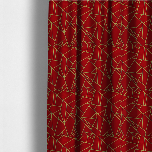 The fabric used to create these made-to-measure curtains is a luxurious vibrant red fabric featuring a fractured, geometric mosaic pattern. The rich, matte background is segmented by a network of recessed metallic gold lines that form sharp, irregular polygons. This "shattered-glass" or "cracked ice" effect creates a striking visual contrast, blending the intense red base with shimmering, Art Deco-inspired gold linework for a dramatic and architectural look.