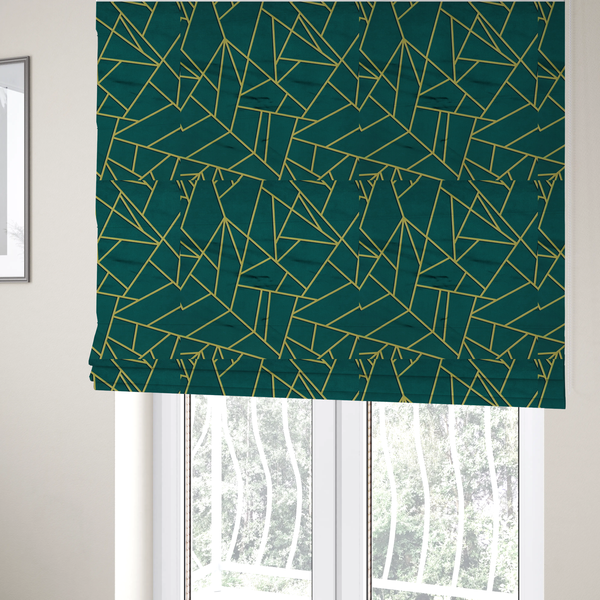 The fabric used to create these Roman blinds is a luxurious deep peacock or dark teal fabric featuring a fractured, geometric mosaic pattern. The moody, matte background is segmented by a network of recessed metallic gold lines that form sharp, irregular polygons. This "shattered-glass" effect pairs a sophisticated, dark jewel-toned base with shimmering, Art Deco-inspired gold accents for a dramatic and architectural look.