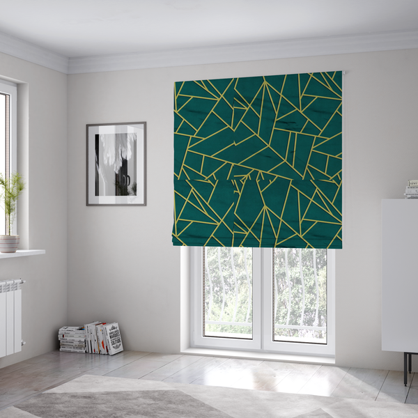 The fabric used to create these Roman blinds is a luxurious deep peacock or dark teal fabric featuring a fractured, geometric mosaic pattern. The moody, matte background is segmented by a network of recessed metallic gold lines that form sharp, irregular polygons. This "shattered-glass" effect pairs a sophisticated, dark jewel-toned base with shimmering, Art Deco-inspired gold accents for a dramatic and architectural look.
