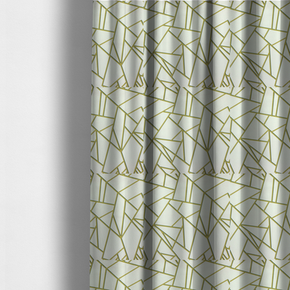 The fabric used to create these made-to-measure curtains is a luxurious stark white or ivory fabric featuring a fractured, geometric mosaic pattern. The clean, matte background is segmented by a network of recessed metallic gold lines that form sharp, irregular polygons. This "shattered-glass" effect creates a sophisticated architectural look, pairing a bright, neutral base with shimmering, Art Deco-inspired gold linework for a high-contrast and contemporary finish