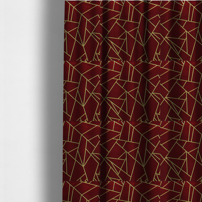 The fabric used to create these made-to-measure curtains is a  luxurious burgundy or wine red fabric featuring a fractured, geometric mosaic pattern. The dark, velvety matte background is segmented by a network of recessed metallic gold lines that form sharp, irregular polygons. This "shattered-glass" effect pairs a rich, deep-toned base with shimmering, Art Deco-inspired gold linework for a dramatic and architectural look.