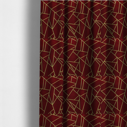 The fabric used to create these made-to-measure curtains is a  luxurious burgundy or wine red fabric featuring a fractured, geometric mosaic pattern. The dark, velvety matte background is segmented by a network of recessed metallic gold lines that form sharp, irregular polygons. This "shattered-glass" effect pairs a rich, deep-toned base with shimmering, Art Deco-inspired gold linework for a dramatic and architectural look.