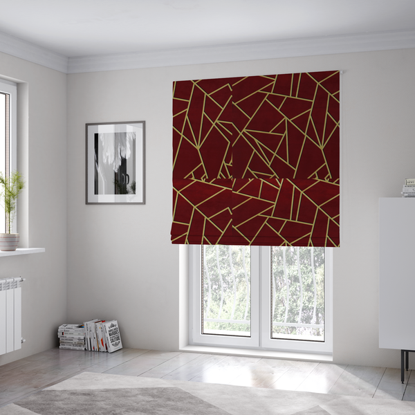The fabric used to create these Roman blinds is a luxurious burgundy or wine red fabric featuring a fractured, geometric mosaic pattern. The dark, velvety matte background is segmented by a network of recessed metallic gold lines that form sharp, irregular polygons. This "shattered-glass" effect pairs a rich, deep-toned base with shimmering, Art Deco-inspired gold linework for a dramatic and architectural look.