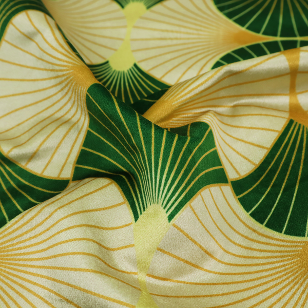 A vibrant, Art Deco-inspired pattern with a repeating fan or scalloped shell motif. The design is structured in interlocking rows, creating a continuous, rhythmic flow across the fabric.