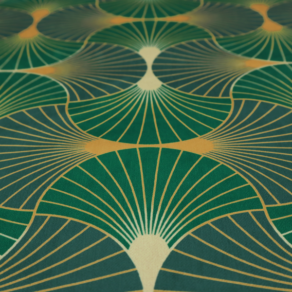 This fabric features a sophisticated Art Deco fan pattern in a moodier, more saturated colour palette than the previous version. The interlocking scallop design creates a dense, elegant texture suitable for high-end decor.