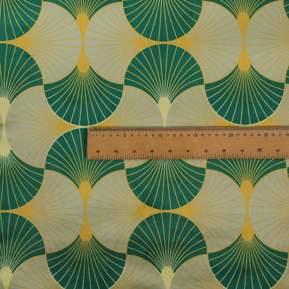 The DP-385-1 fabric presents a sophisticated Art Deco aesthetic featuring an interlocking scalloped fan motif that creates a rhythmic, architectural symmetry across the textile. This specific variation utilizes a refined colour palette of deep emerald green, cool slate grey, and warm ochre. The pattern is composed of alternating shells where thin lines radiate from golden central points, set against a subtle cream background that peeks through at the base of each fan.