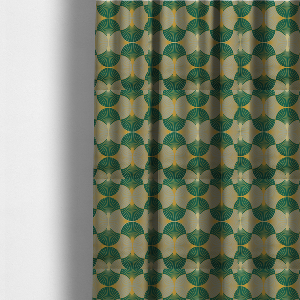 The fabric used to create these made-to-measure curtains, presents a sophisticated Art Deco aesthetic featuring an interlocking scalloped fan motif that creates a rhythmic, architectural symmetry across the textile. This specific variation utilizes a refined colour palette of deep emerald green, cool slate grey, and warm ochre. The pattern is composed of alternating shells where thin lines radiate from golden central points, set against a subtle cream background that peeks through at the base of each fan.