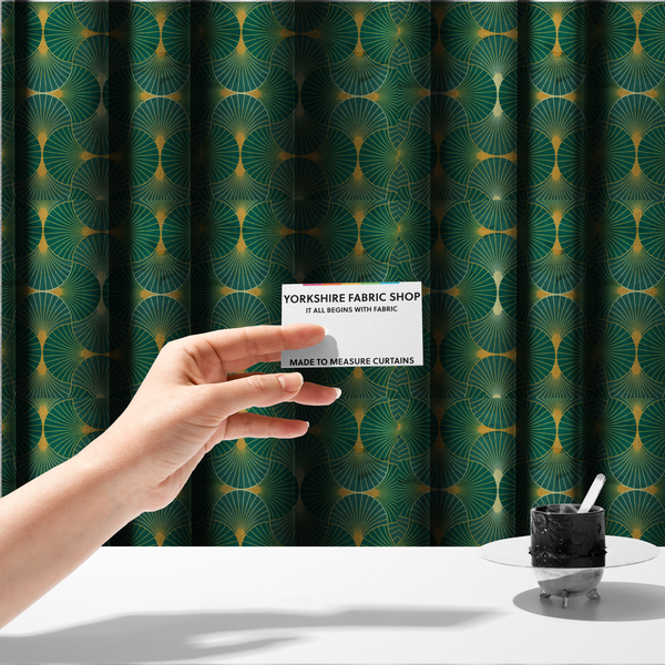 The fabric used to create these made-to-measure curtains showcases a classic Art Deco aesthetic with a repeating, interlocking scalloped fan motif that creates a rhythmic "fish scale" layout. This design features a rich, dual-tone colour scheme of deep emerald green and saturated teal, accented by thin, radiating lines in bright ochre.