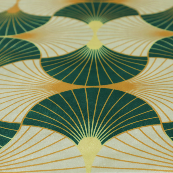 This fabric features a cohesive Art Deco-inspired print, showcasing a rhythmic, interlocking scalloped fan motif that evokes the architectural elegance of the 1920s. Each variation uses a "fish scale" layout with thin lines radiating from golden-orange focal points, but offers a distinct mood through its specific colour story.