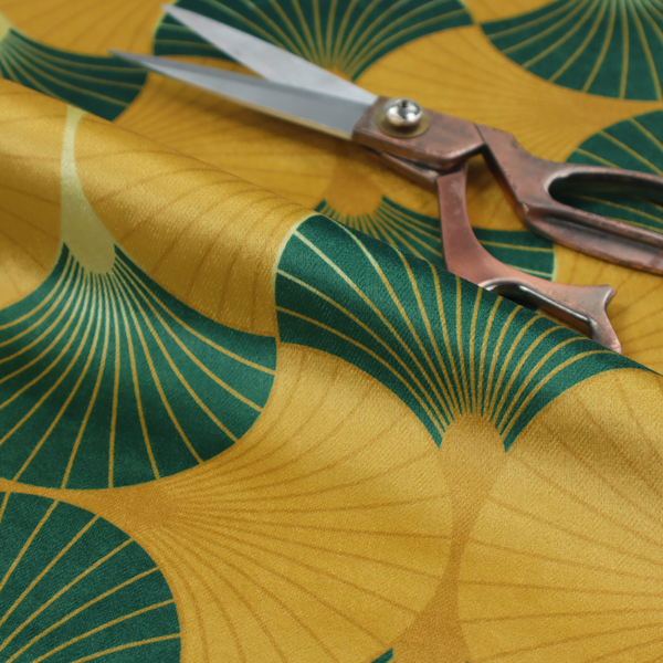 This fabric, DP-388-1, features a warm and inviting take on the classic Art Deco fan pattern, utilizing a gold-dominant palette that radiates elegance.