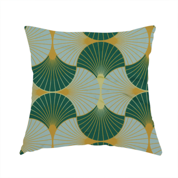 The fabric used to create this handmade cushion offers a fresh and airy take on the classic Art Deco aesthetic, utilizing a cool-toned palette that lightens the geometric structure.