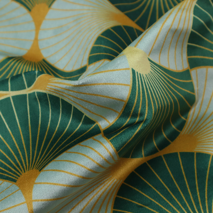 The DP-390-1 fabric offers a fresh and airy take on the classic Art Deco aesthetic, utilizing a cool-toned palette that lightens the geometric structure.