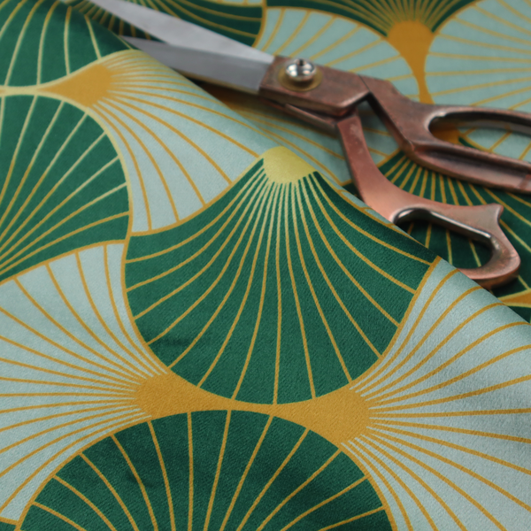 The DP-390-1 fabric offers a fresh and airy take on the classic Art Deco aesthetic, utilizing a cool-toned palette that lightens the geometric structure.