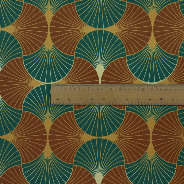 The DP-391-1 fabric offers a grounded and earthy interpretation of the classic Art Deco fan motif. This design features a rhythmic, interlocking scalloped shell pattern where fine lines radiate from central golden-ochre focal points to create a symmetrical "fish scale" layout. This specific version is defined by its sophisticated colour story, pairing deep forest green with rich terracotta or rust brown.