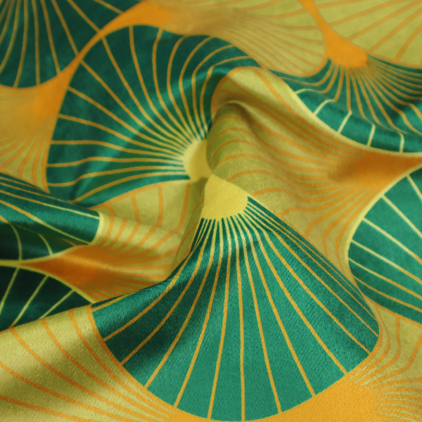 The DP-393-1 fabric features a vibrant and energetic take on the classic Art Deco fan motif, characterized by a citrus-inspired colour palette.