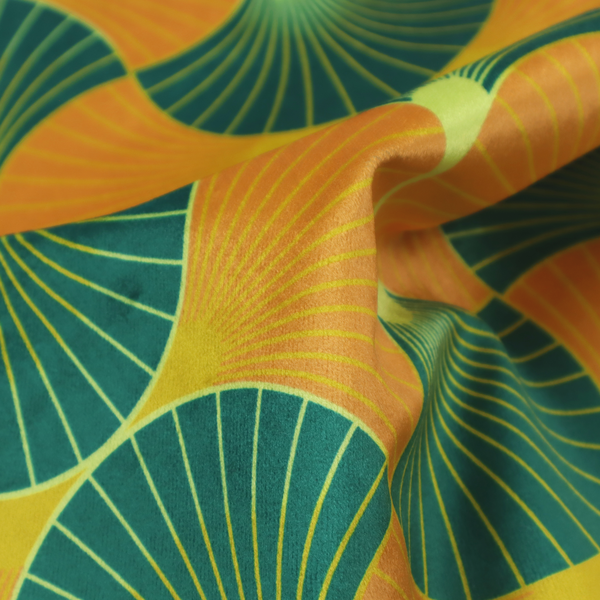 The DP-397-1 fabric showcases a vibrant and warm Art Deco aesthetic, featuring a rhythmic, interlocking scalloped fan motif in a "fish scale" arrangement. This specific colourway utilizes a bold, high-contrast palette of deep forest green and saturated orange fans.
