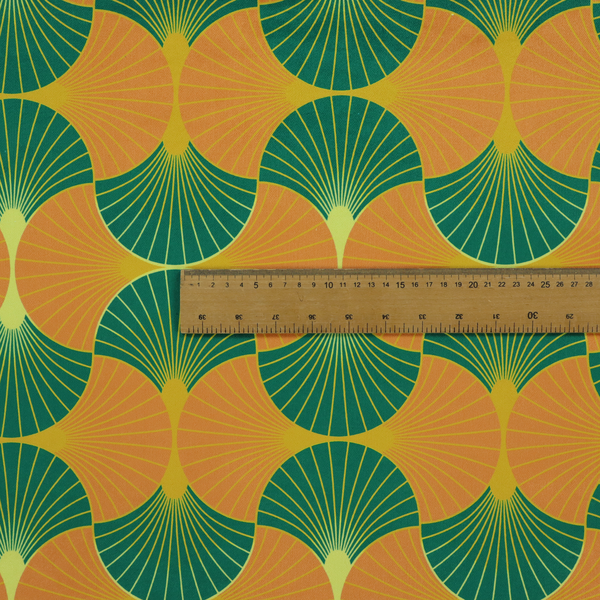 The DP-397-1 fabric showcases a vibrant and warm Art Deco aesthetic, featuring a rhythmic, interlocking scalloped fan motif in a "fish scale" arrangement. This specific colourway utilizes a bold, high-contrast palette of deep forest green and saturated orange fans.