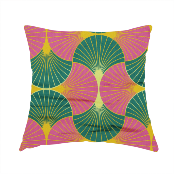 The fabric used to create this handmade cushion features a bold and high-energy Art Deco aesthetic, characterized by its signature interlocking scalloped fan motif in a vibrant, modern colourway.