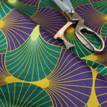 The DP-399-1 fabric features a regal and high-contrast Art Deco aesthetic, characterized by its rhythmic, interlocking scalloped fan motif in a "fish scale" layout. This specific colourway utilizes a bold and sophisticated palette.