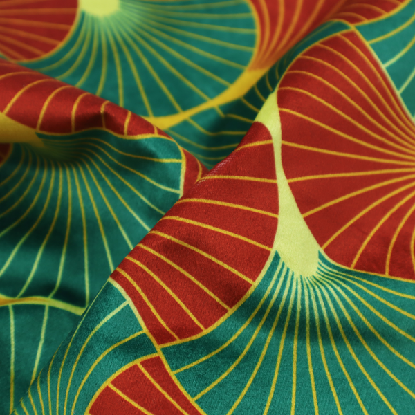 The DP-400-1 fabric features a bold, high-contrast Art Deco aesthetic, characterized by its signature interlocking scalloped fan motif in a rich, traditional colourway.