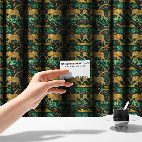 The fabric used to create these made-to-measure curtains is a fabric with large elephants patterned with leopard-like spots facing one another.