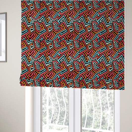 The fabric used to create these Roman blinds is a bold, abstract geometric pattern with a vibrant, interlocking maze-like design.