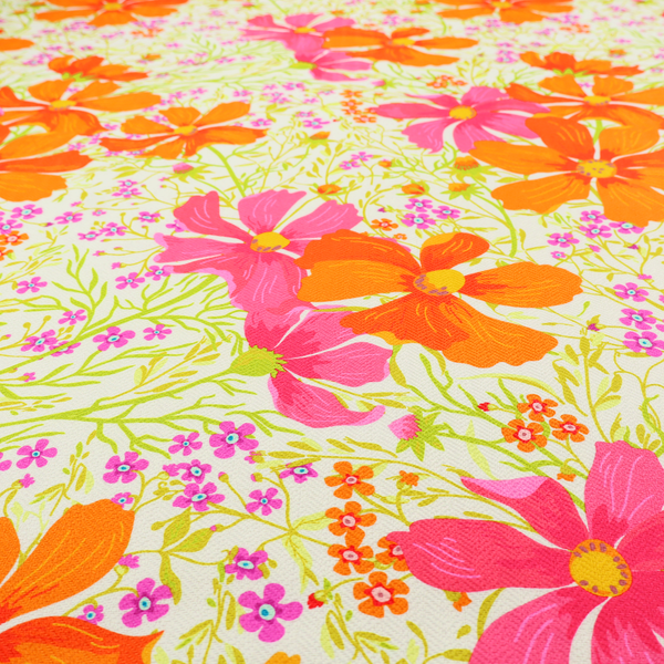 This fabric features a dense, vibrant botanical and floral pattern with a retro, meadow-like feel.