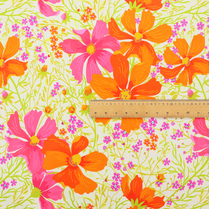 This fabric features a dense, vibrant botanical and floral pattern with a retro, meadow-like feel.