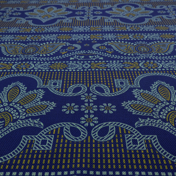 Intricate royal blue and yellow fabric featuring traditional ornate damask and paisley motifs arranged in horizontal decorative bands.