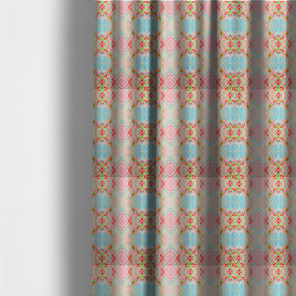The fabric used to create these made-to-measure curtains is a vibrant, repeating pattern featuring abstract botanical shapes, paisley motifs, and floral elements in bright shades of pink, turquoise blue, lime green, and orange.