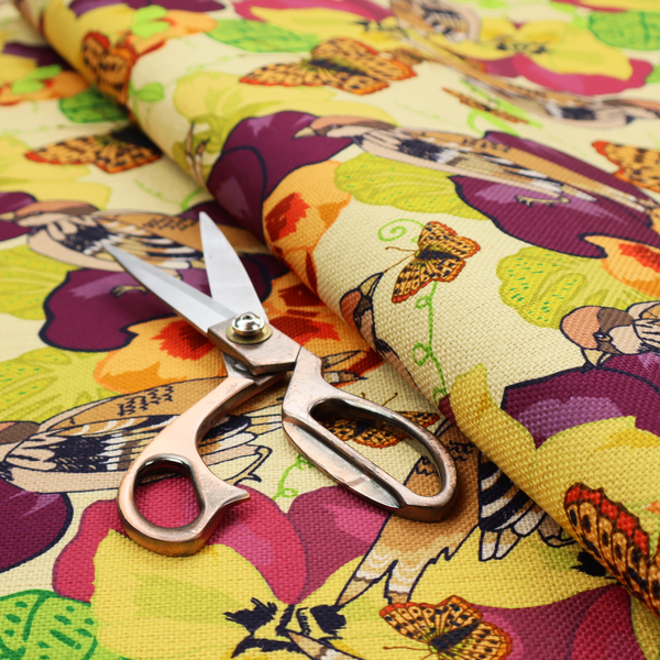 Detailed repeating pattern featuring sparrows, butterflies, and large pansy flowers in shades of yellow, purple, orange, and red against a cream background.