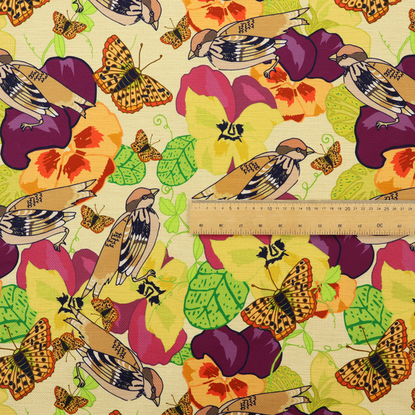Detailed repeating pattern featuring sparrows, butterflies, and large pansy flowers in shades of yellow, purple, orange, and red against a cream background.
