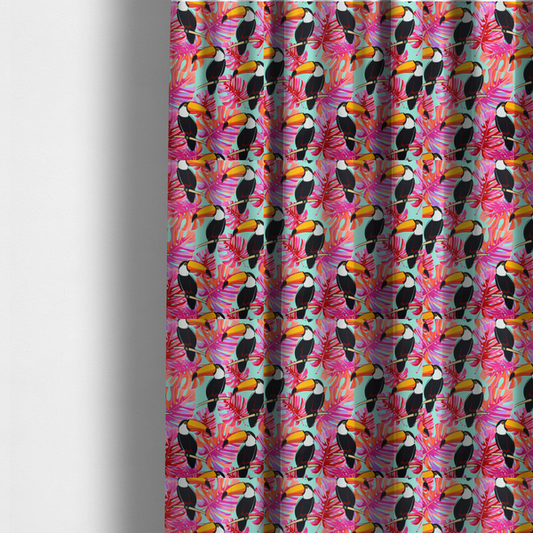 The fabric used to create these made-to-measure curtains features vibrant, tropical-themed repeating pattern showcasing toucans and exotic foliage.
