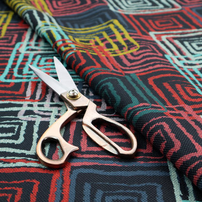 Abstract geometric pattern featuring overlapping nested squares in vibrant shades of red, teal, yellow, and grey on a dark background.
